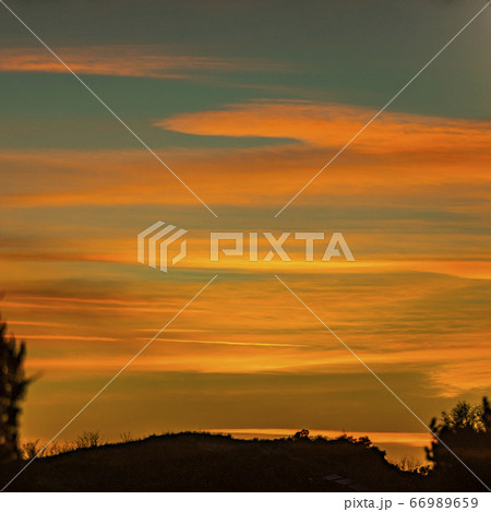 USA, Idaho, Boise, Orange sunset over hill 66989659