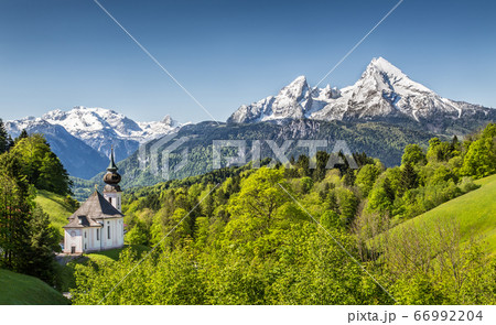 Beautiful mountain landscape with church in the Bavarian Alps Beautiful mountain landscape with church in the Bavarian Alps 66992204