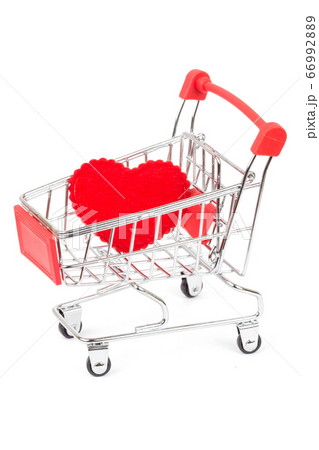 Shopping cart with a heart symbol 66992889