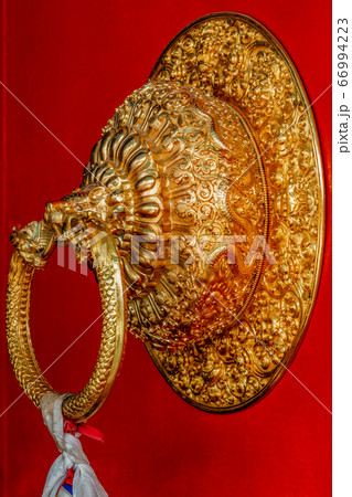 Lion shaped door handle in Buddhist temple 66994223