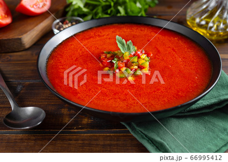 Close up of a plate with summer refreshing tomatoe Close up of a plate with summer refreshing tomatoe 66995412