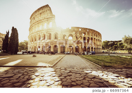 Colosseum in Rome and morning sun, Italy 66997364