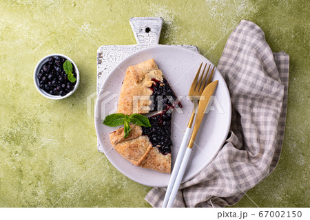 Sweet homemade galette pie with blueberry 67002150