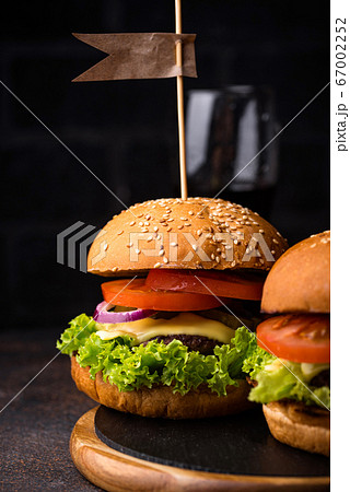 Burger and cheeseburger with tomato Burger and cheeseburger with tomato 67002252
