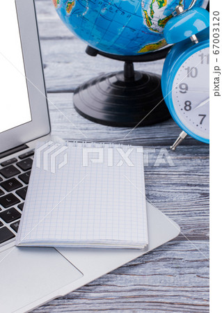 Close up blank notepad on a laptop pc. 67003120