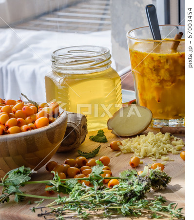 hot cocktail recipe with sea buckthorn and honey strengthens immune system hot cocktail recipe with sea buckthorn and honey strengthens immune system 67003454