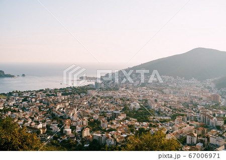 The modern city of Budva, from a bird's-eye view, aerial photo from a drone. The modern city of Budva, from a bird's-eye view, aerial photo from a drone. 67006971