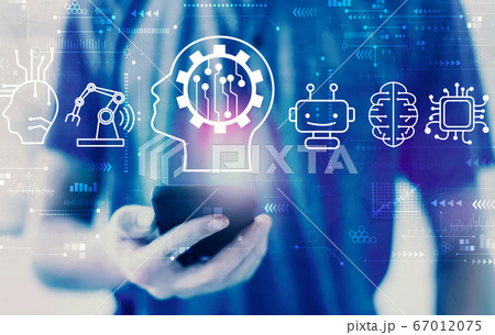 Future technology concept with man using a smartphone 67012075
