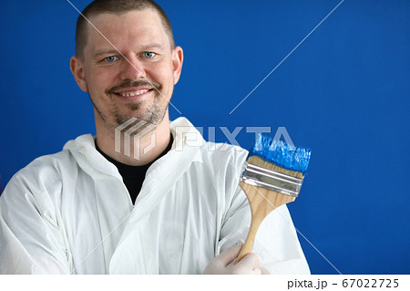 Happy cheerful person working in apartment 67022725