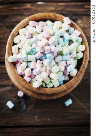 Colored marshmallow on the wooden table Colored marshmallow on the wooden table 67022853
