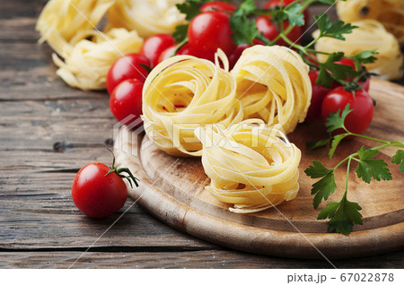 Ingredients for cooking pasta and tomato on the Ingredients for cooking pasta and tomato on the 67022878