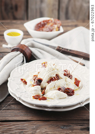 Traditional italian antipasto with burrata and dry 67022963