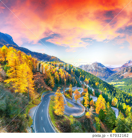Stunning view of Maloja pass road at autumn time. 67032162