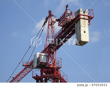 Tower Crane used to lift the heavy load at the construction site. Manually operate by the operator. Normally used at huge scale or high rise building construction.    67033633