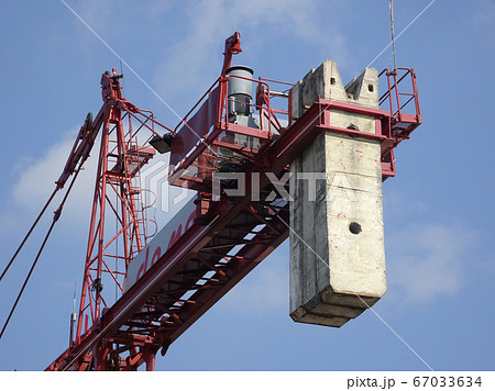Tower Crane used to lift the heavy load at the construction site. Manually operate by the operator. Normally used at huge scale or high rise building construction.    67033634