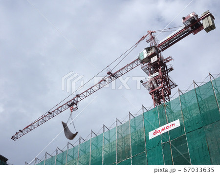 Tower Crane used to lift the heavy load at the construction site. Manually operate by the operator. Normally used at huge scale or high rise building construction.    67033635