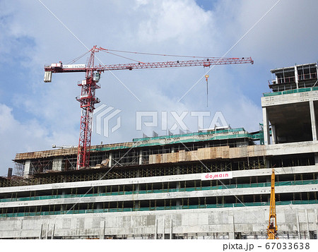 Tower Crane used to lift the heavy load at the construction site. Manually operate by the operator. Normally used at huge scale or high rise building construction.    67033638