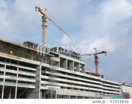 Tower Crane used to lift the heavy load at the construction site. Manually operate by the operator. Normally used at huge scale or high rise building construction.    67033640