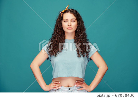 Pretty curly-haired girl 67038430