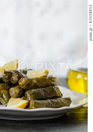Stuffed grape leaves with rice,olive oil and herbs Stuffed grape leaves with rice,olive oil and herbs 67038653