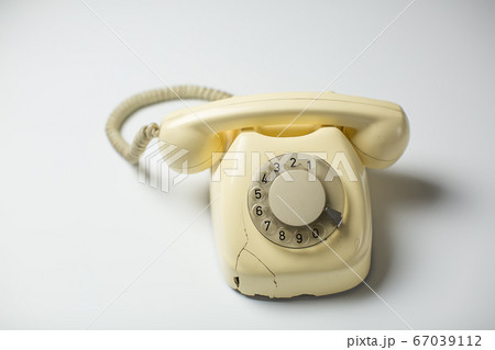 Retro rotary telephone with cracks and broken 67039112