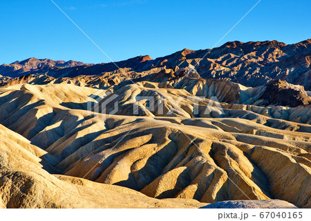 Zabriski Point Mudstones form Badlands Death Valley National Park 67040165