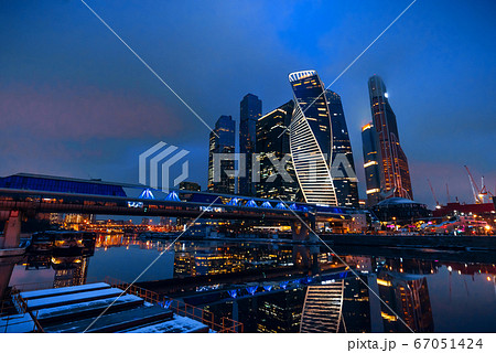 Moscow city skyscraper towers and Bagration Bridge by the river in the Russian capital 67051424