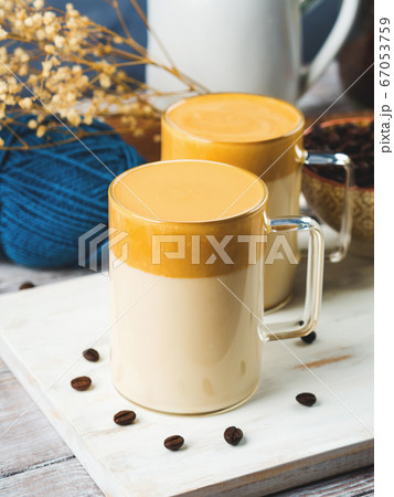 Whipped dalgona coffee drink in mug Whipped dalgona coffee drink in mug 67053759