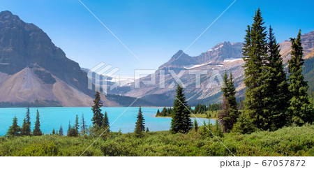 Beautiful landscape with azure blue mountain lake in the Rocky Mountains, Canada Beautiful landscape with azure blue mountain lake in the Rocky Mountains, Canada 67057872