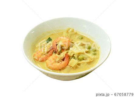 spicy boiled slice pickled bamboo shoot with shrimp and eggplant in coconut milk curry soup on bowl spicy boiled slice pickled bamboo shoot with shrimp and eggplant in coconut milk curry soup on bowl 67058779