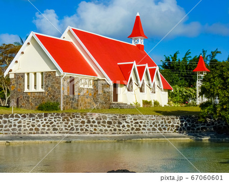 Red roofed church in Cap Malheureux, North of 67060601