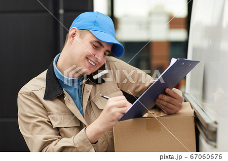 Man working in delivery service Man working in delivery service 67060676