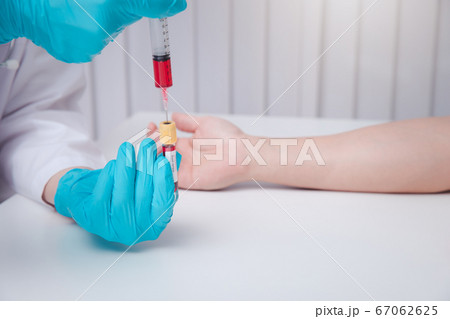 Doctor or Medical staff collect blood samples from patients infected with coronavirus or COVID-19. 67062625