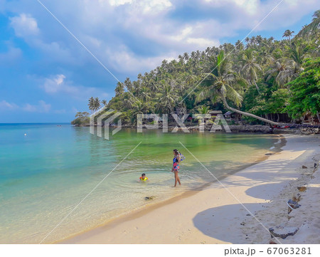 Woman and boy wearing a life jacket, scuba diving in the sea at Haad salad Beach , koh Phangan 67063281