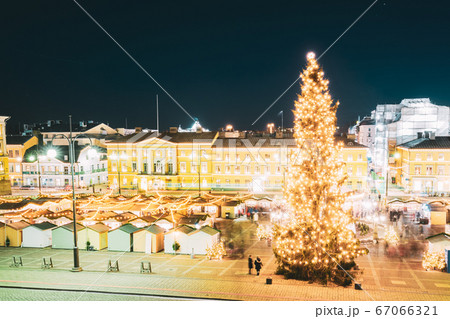 Helsinki, Finland. Christmas Xmas Market With Christmas Tree On Senate Square In Evening Night Illuminations. 67066321
