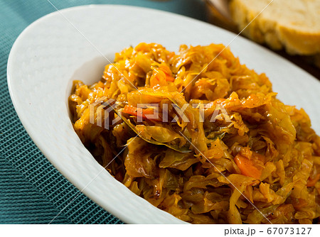 Plate of tasty stewed cabbage Plate of tasty stewed cabbage 67073127