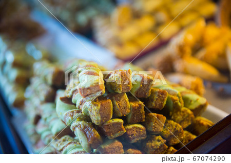 Variety of oriental sweets on counter Variety of oriental sweets on counter 67074290