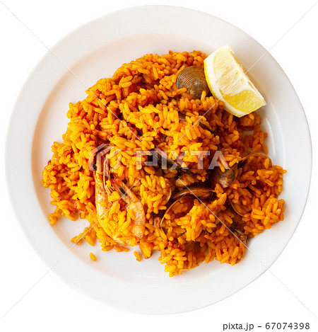 Seafood paella with lemon Seafood paella with lemon 67074398