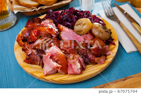 Beer pork knuckle with braised cabbage Beer pork knuckle with braised cabbage 67075704