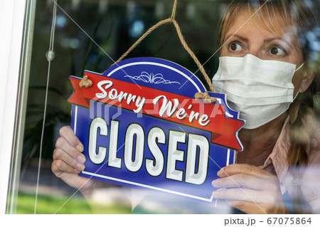 Female Store Owner Wearing Medical Face Mask Female Store Owner Wearing Medical Face Mask 67075864