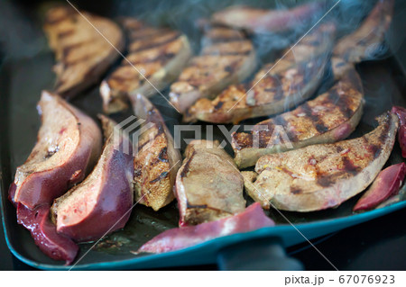 Pork liver on frying pan 67076923