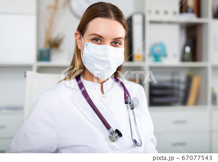 Female doctor working in medical office Female doctor working in medical office 67077543