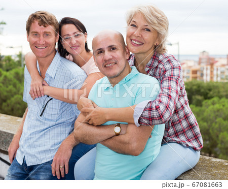 Portrait of smiling mature people outdoors 67081663