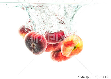 Bunch of doughnut peaches isolated on white, 67089415