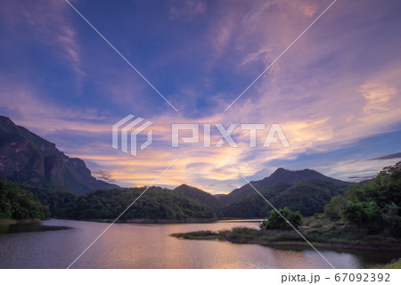 Beautiful view of reservoir and mountain Ban Mae Khaon Chiang Dao in evening time, Chiangmai Thailand Beautiful view of reservoir and mountain Ban Mae Khaon Chiang Dao in evening time, Chiangmai Thailand 67092392