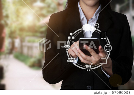 Social media digital in virtual icon globe shape business open his hand, working touch screen smartphone. Social media digital in virtual icon globe shape business open his hand, working touch screen smartphone. 67096033