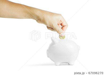human hand and piggy bank 67096270
