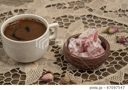 coffee and turkish delight on table decorated with 67097547