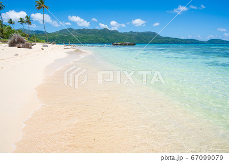 Tropical beach blue sky and turquoise ocean in Tropical beach blue sky and turquoise ocean in 67099079