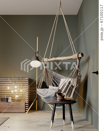 Boho style hanging chair in a modern bedroom. Boho style hanging chair in a modern bedroom. 67100117